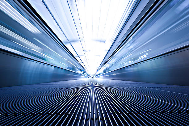 airport walkway connecting terminals. abstract tunnel, personal perspective.